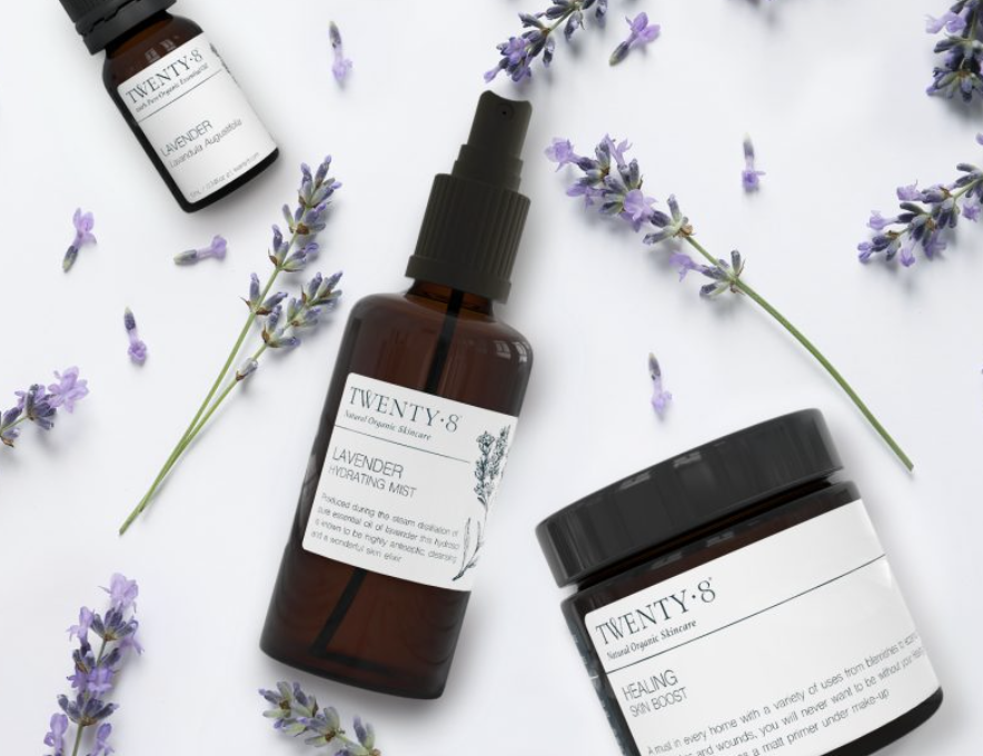 Twenty8 Essential Oils logo with purple drop icon and elegant font.